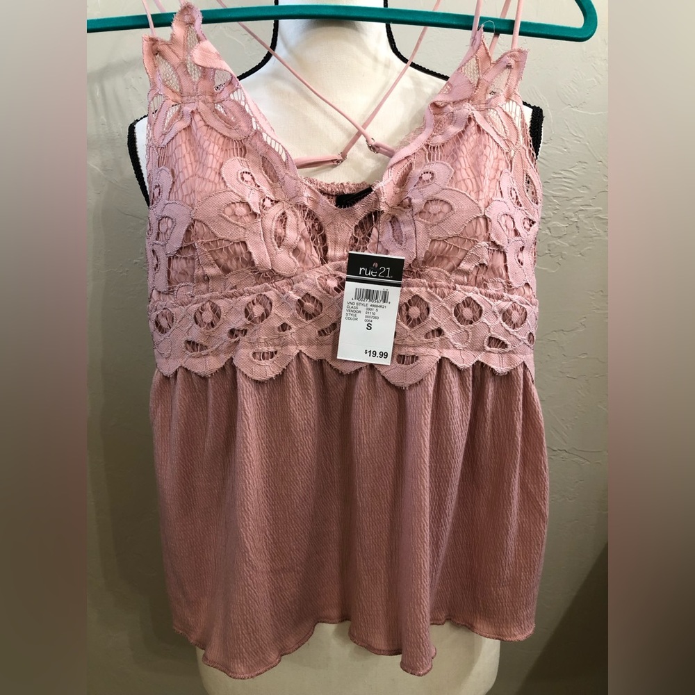 Women’s top/ never worn tags still on. Color is Marv pink.